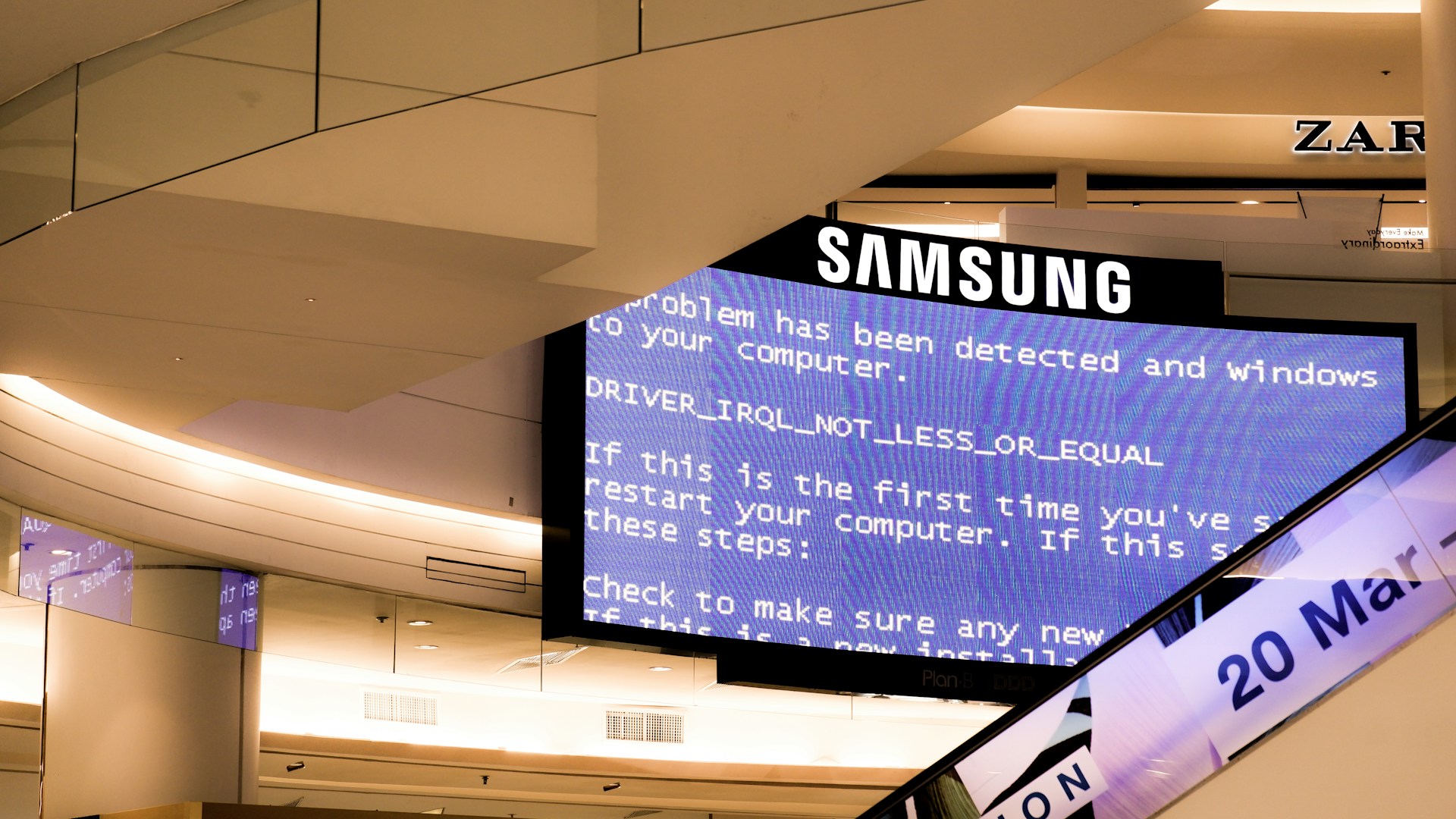 Image of a Blue Screen of Death on a large Samsung screen - what Crowdstrike caused a lot of!