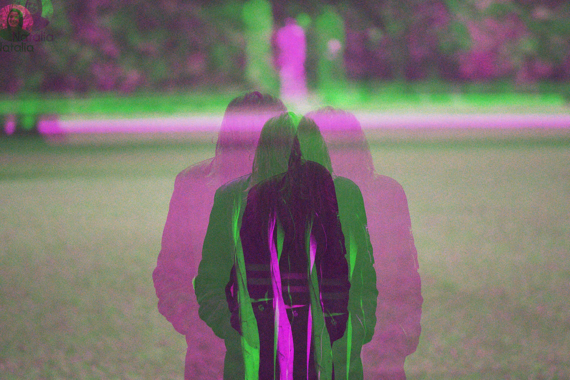 This is a blurred picture of someone's back, making it look like multiple people. maybe imaginary people?? Your imaginary friend might've been your future marketeer reaching out to get you to create customer personas.